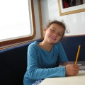 working on her journal